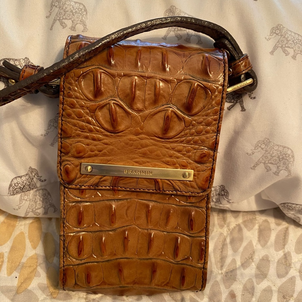 Authentic Brahmin leather cell phone holder.